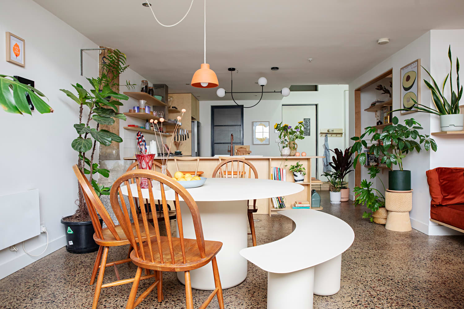 View of See a Renovated Loft with Built-In Storage & Plywood Shelves ...